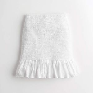 high rise, white mini skirt